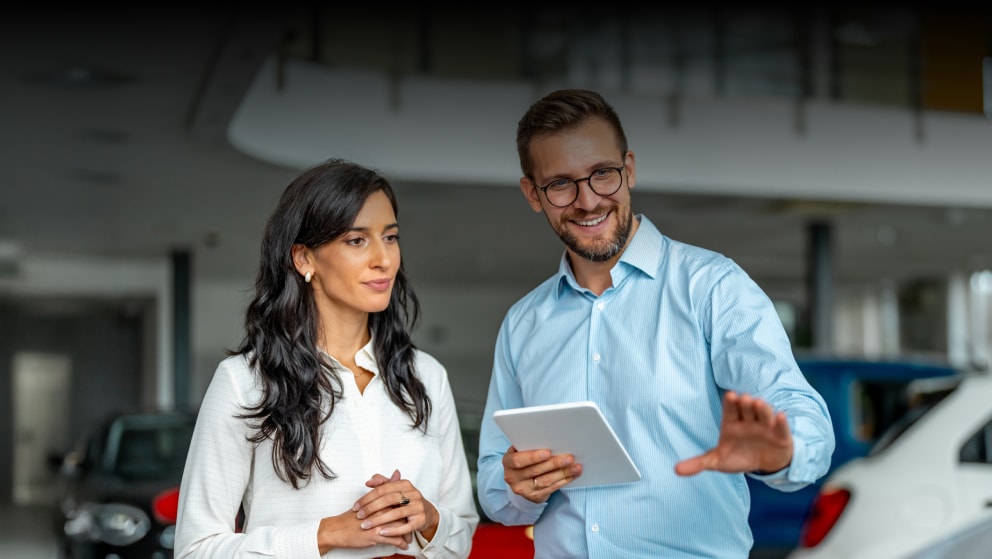 Executive helping the female customer to make the right decision
